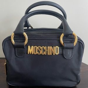 MOSCHINO mini black bowler   9.5 x 6 x 5. Like new. Vintage Moschino Redwall